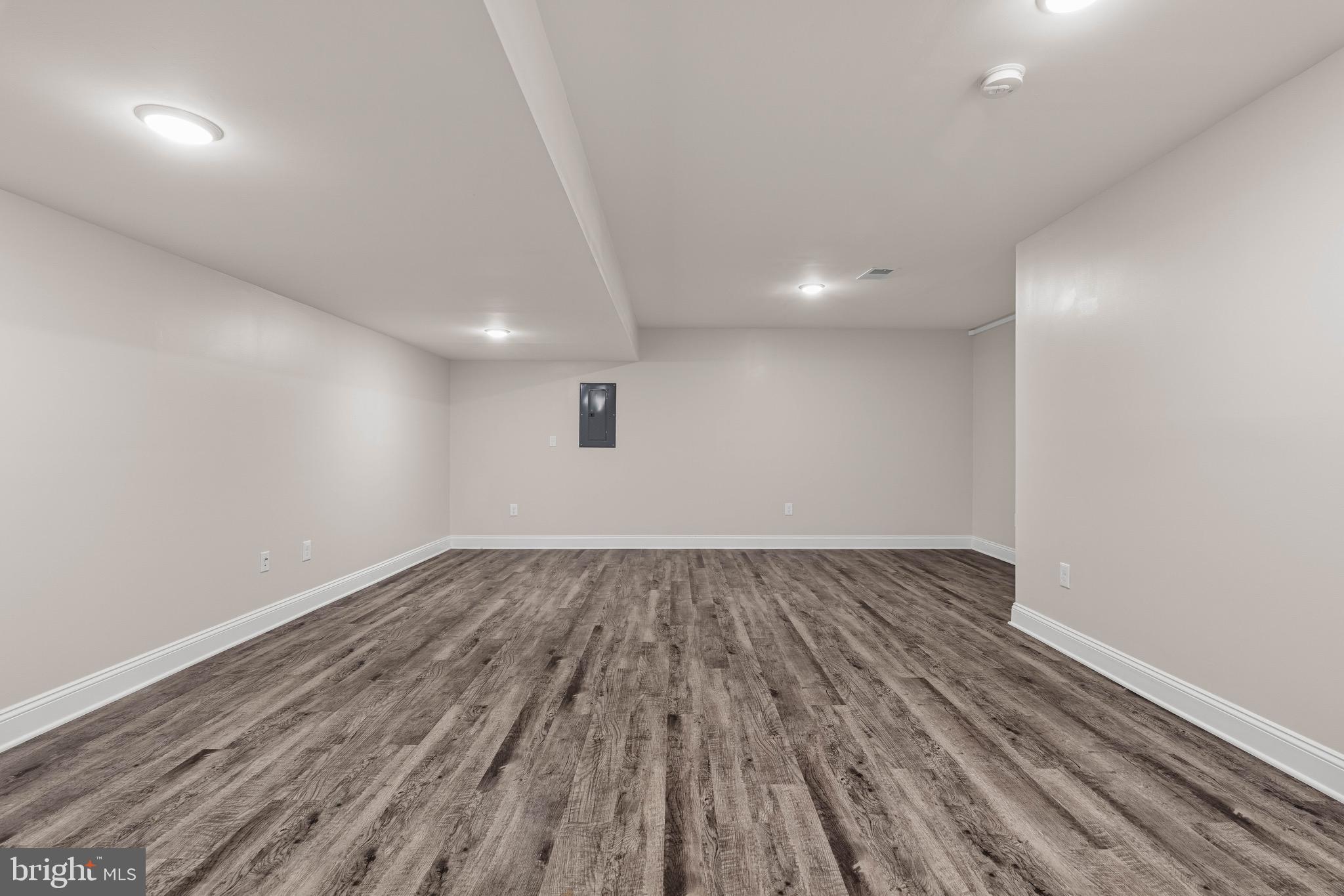 303 # 2 Witherspoon Street Princeton, NJ 08542 - Photo 28 of 31 an empty room with wooden floor and windows