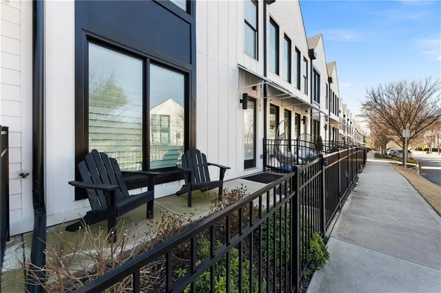a view of a balcony with chairs