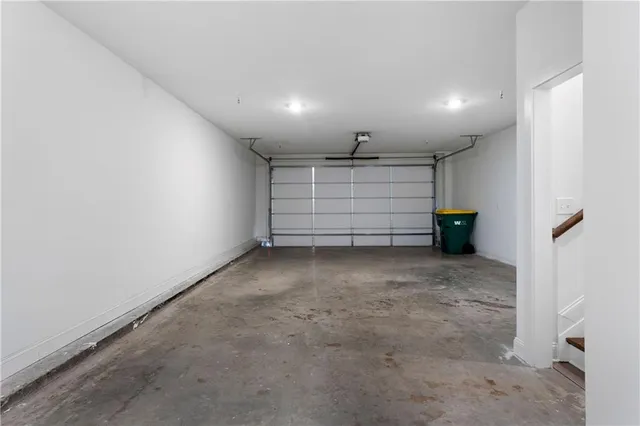 a view of room with stairs and a window