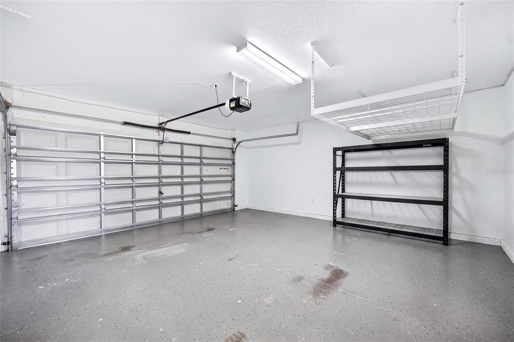 31724 Sun Kettle Loop Wesley Chapel, FL 33545 - Photo 41 of 49 a view of a room with garage