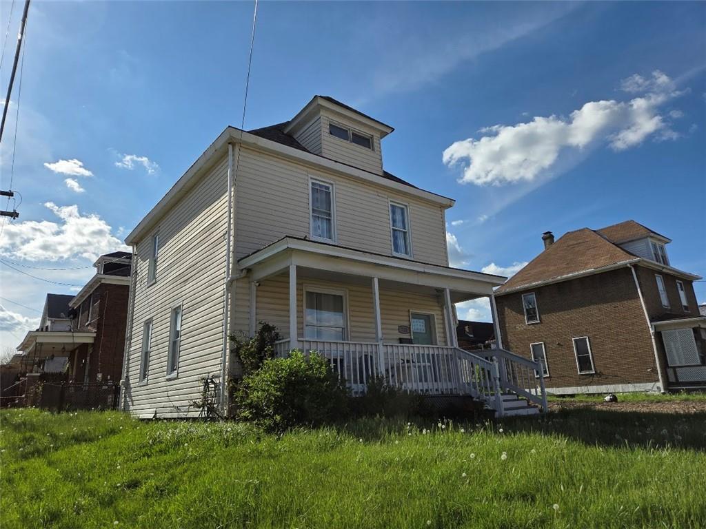 735 South 14th Street Monessen, PA 15062 - Photo 2 of 15 a view of a house with a yard