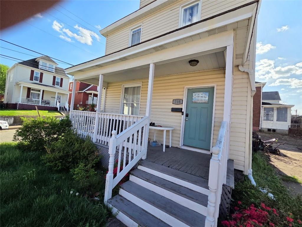 735 South 14th Street Monessen, PA 15062 - Photo 3 of 15 a view of a house with backyard and porch
