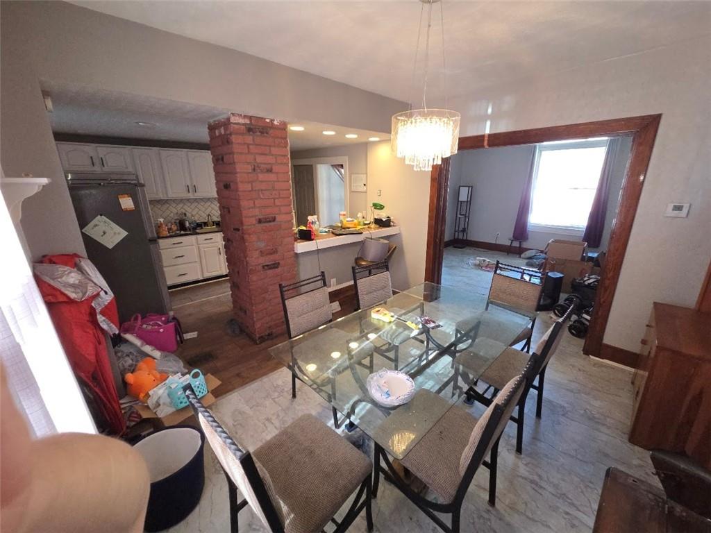 735 South 14th Street Monessen, PA 15062 - Photo 6 of 15 a view of a dining room with furniture