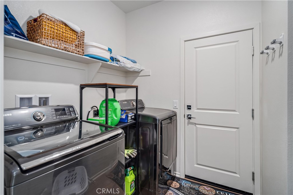 45628 Rachel Avenue Lancaster, CA 93535 - Photo 26 of 36 a living room with furniture and potted plant