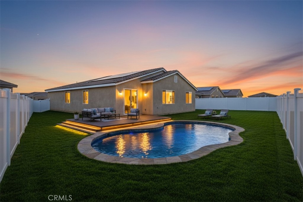 45628 Rachel Avenue Lancaster, CA 93535 - Photo 27 of 36 a view of a house with swimming pool