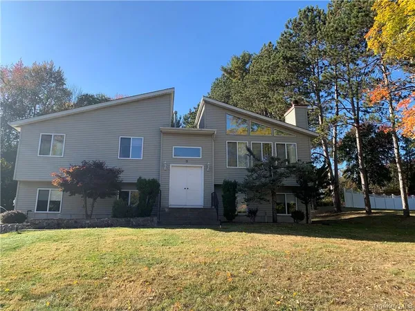 a house view with a outdoor space