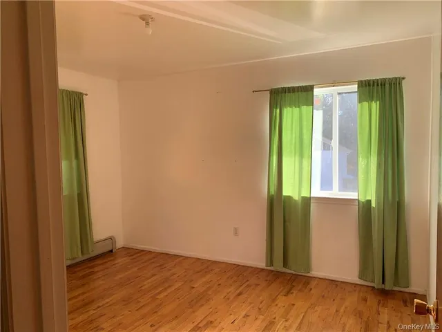 an empty room with window