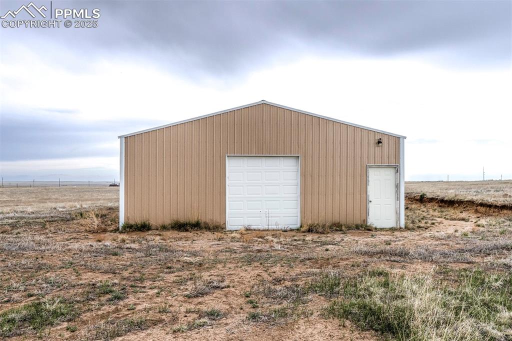 33455 Fossinger Road Yoder, CO 80864 - Photo 1 of 29 a house view with a backyard space