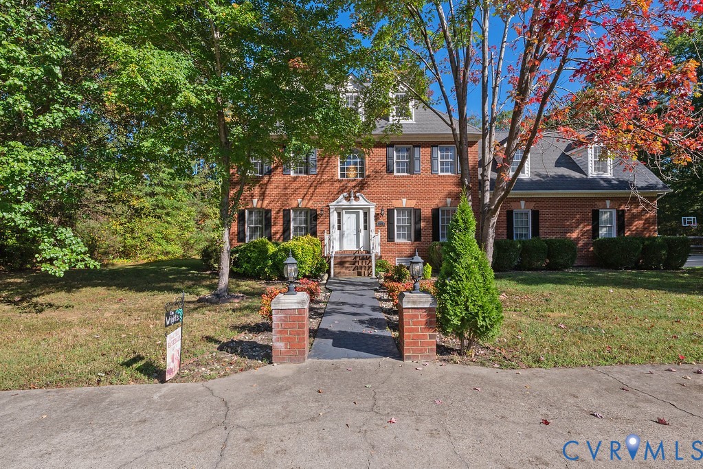 15438 West Patrick Henry Road Montpelier, VA 23192 - Photo 2 of 45 front view of a house with a tree