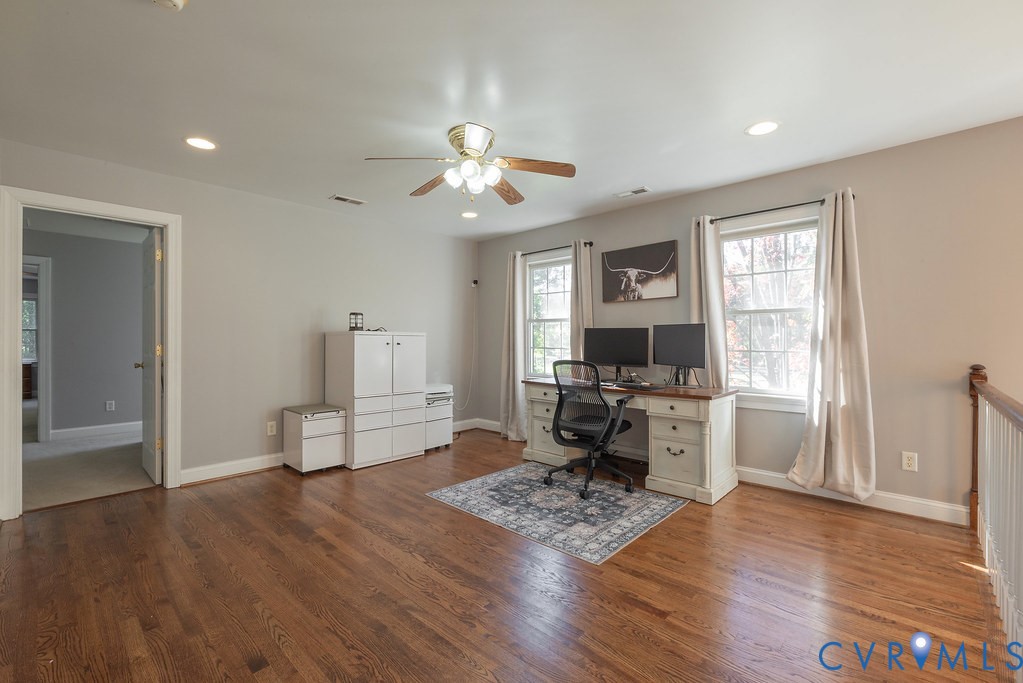 15438 West Patrick Henry Road Montpelier, VA 23192 - Photo 24 of 45 a living room with furniture a dining table and a window