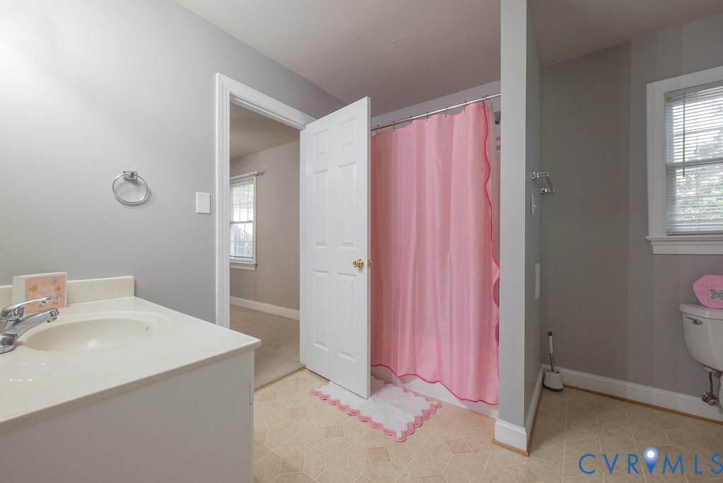 15438 West Patrick Henry Road Montpelier, VA 23192 - Photo 32 of 45 a bathroom with a sink and a mirror