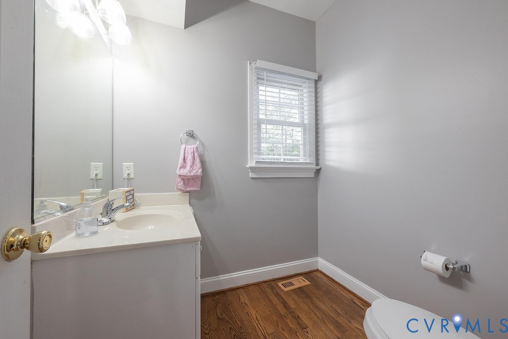 15438 West Patrick Henry Road Montpelier, VA 23192 - Photo 42 of 45 a bathroom with a sink and a mirror