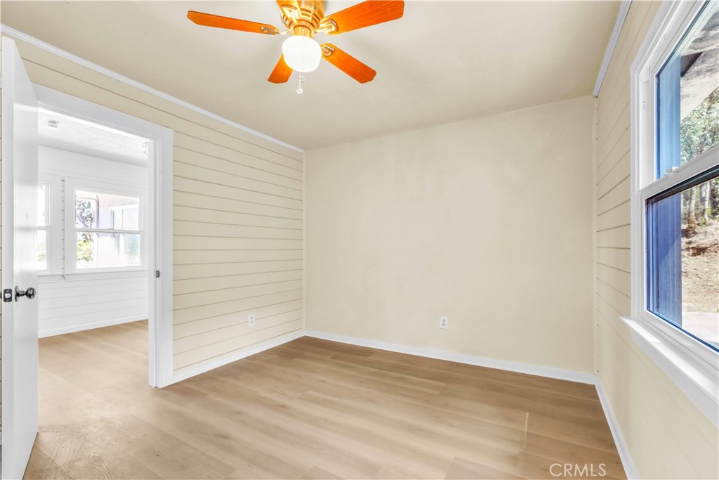 15905 Kugelman Street Lower Lake, CA 95457 - Photo 64 of 75 an empty room with windows and fan