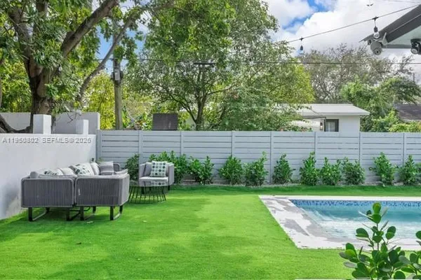 a garden view with a seating space