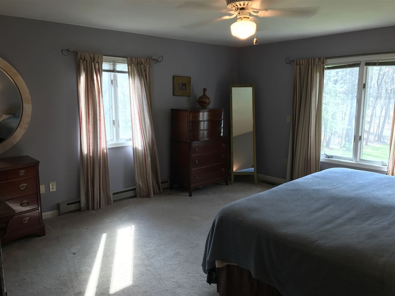 676 Todd Road Mount Sidney, VA 24467 - Photo 26 of 50 a bedroom with a bed and a chandelier
