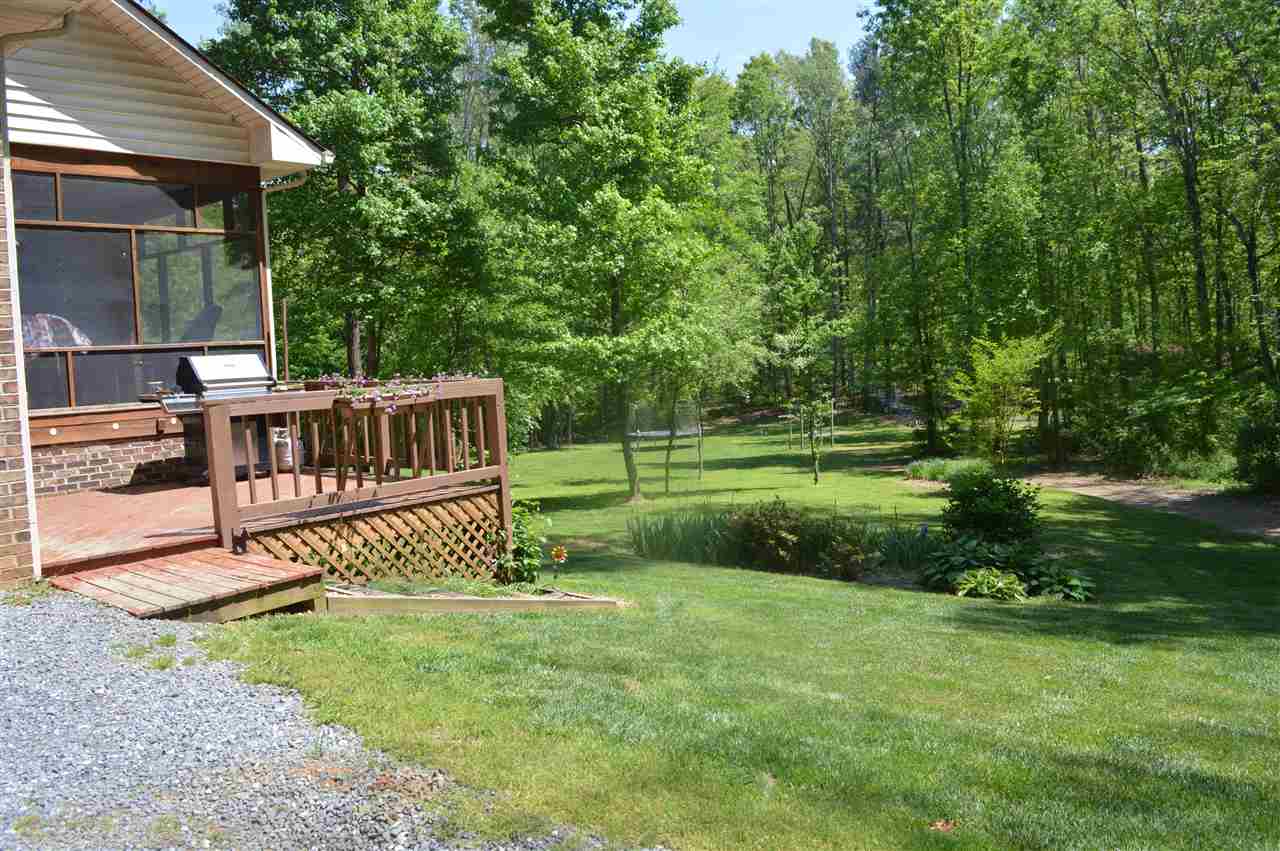 676 Todd Road Mount Sidney, VA 24467 - Photo 4 of 50 a view of a deck with a yard