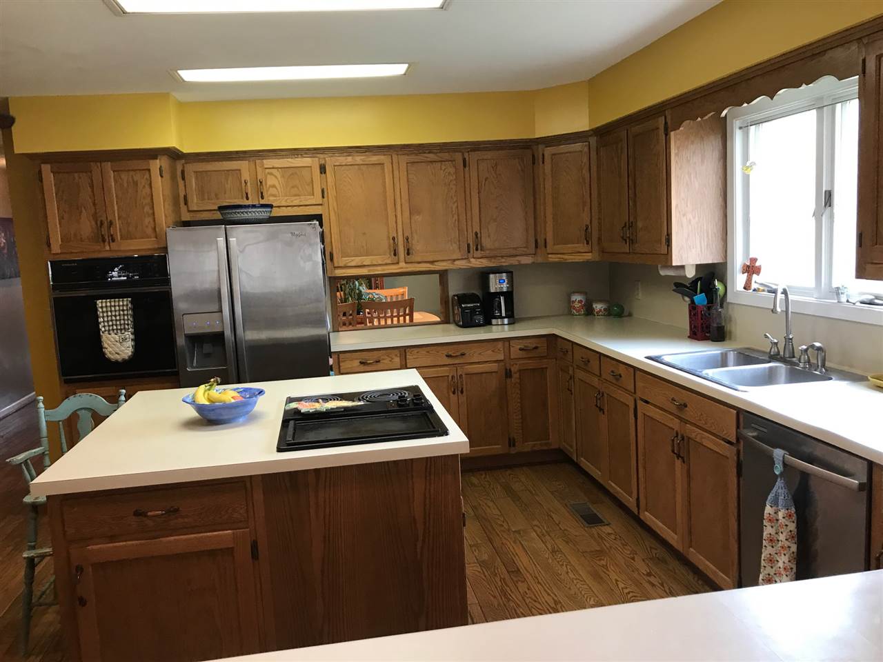 676 Todd Road Mount Sidney, VA 24467 - Photo 8 of 50 a kitchen with a sink stove and refrigerator