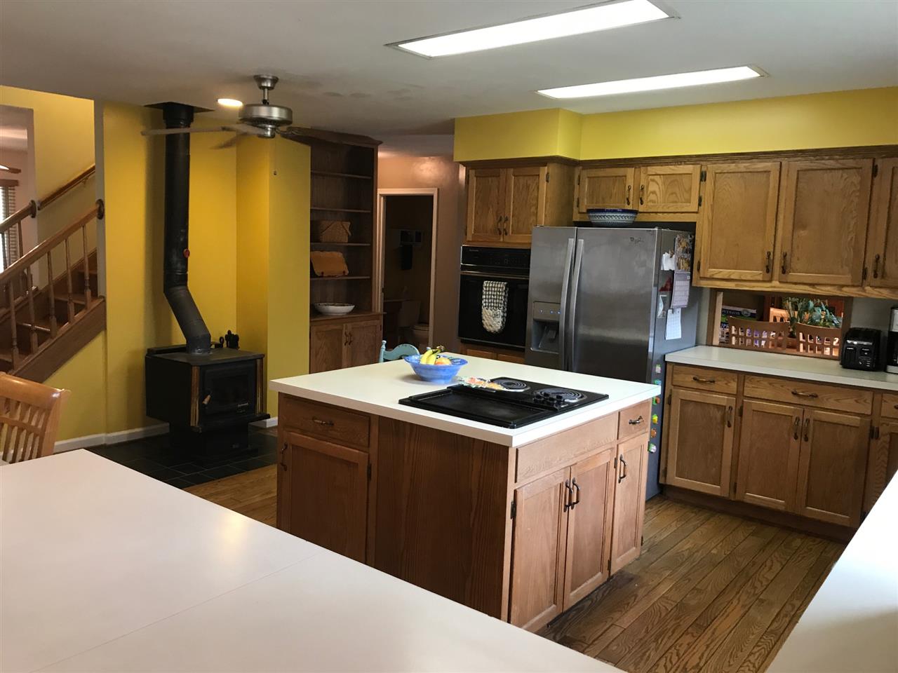 676 Todd Road Mount Sidney, VA 24467 - Photo 9 of 50 a kitchen with a sink stove and refrigerator