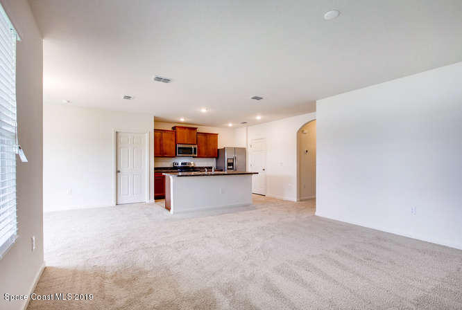 3768 Loggerhead Lane Mims, FL 32754 - Photo 4 of 40 LIVING-KITCHEN
