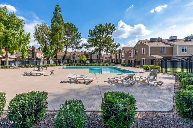 a garden view with a seating space