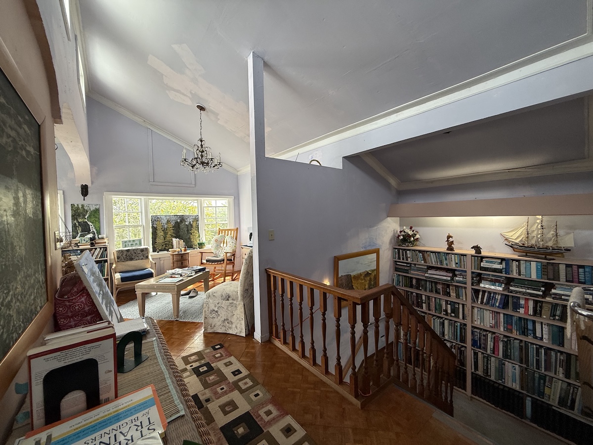 37 Mehau Lane Hilo, HI 96720 - Photo 8 of 24 a living room with lots of furniture and a fireplace