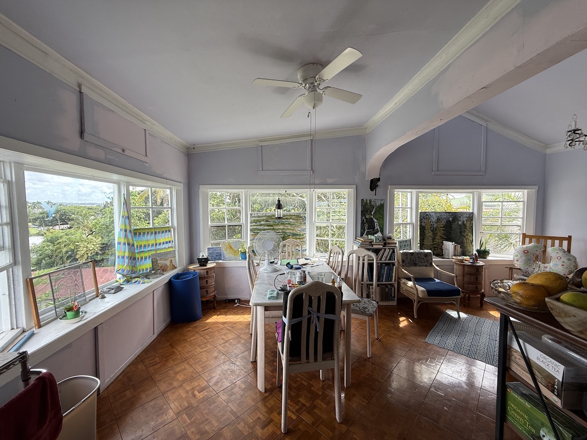 37 Mehau Lane Hilo, HI 96720 - Photo 9 of 24 a living room with furniture tv and large windows