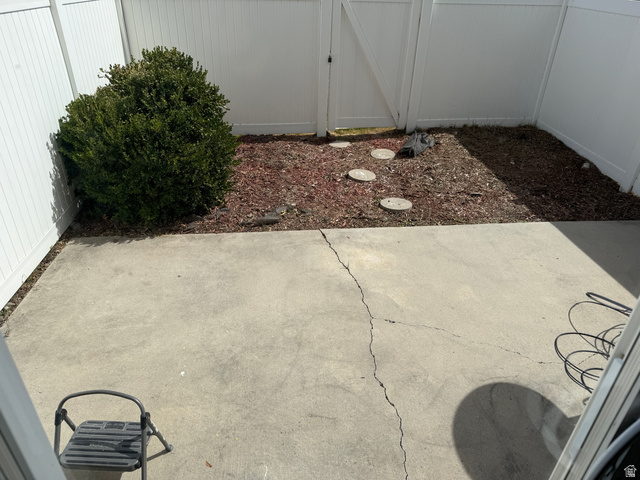 747 Hanover Drive Orem, UT 84058 - Photo 21 of 30 View of patio / terrace featuring a gate