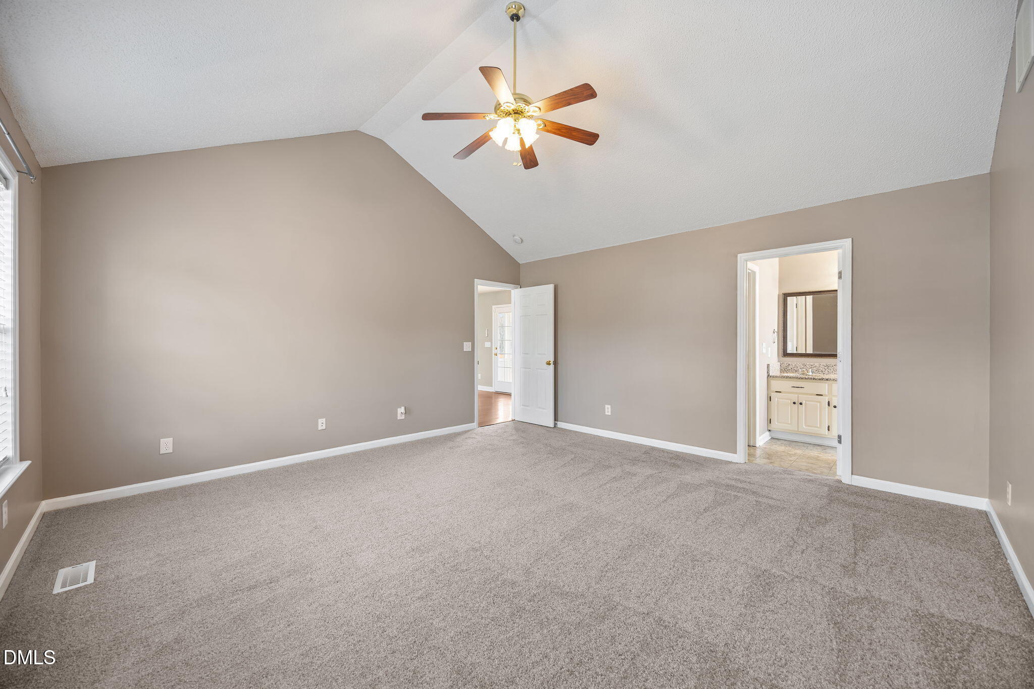 115 Edmondson Drive Willow Spring, NC 27592 - Photo 16 of 39 a view of an empty room with a window