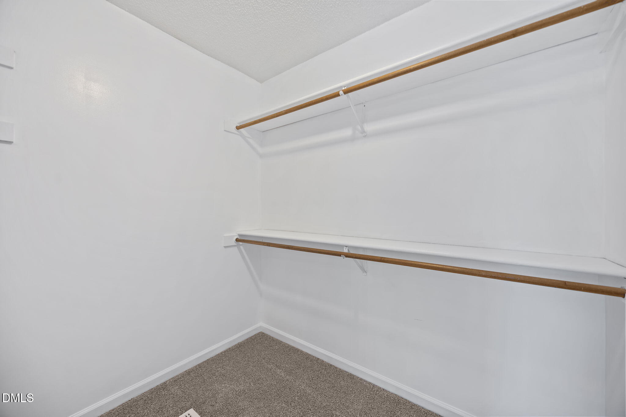 115 Edmondson Drive Willow Spring, NC 27592 - Photo 19 of 39 a view of small space with racks on the wall