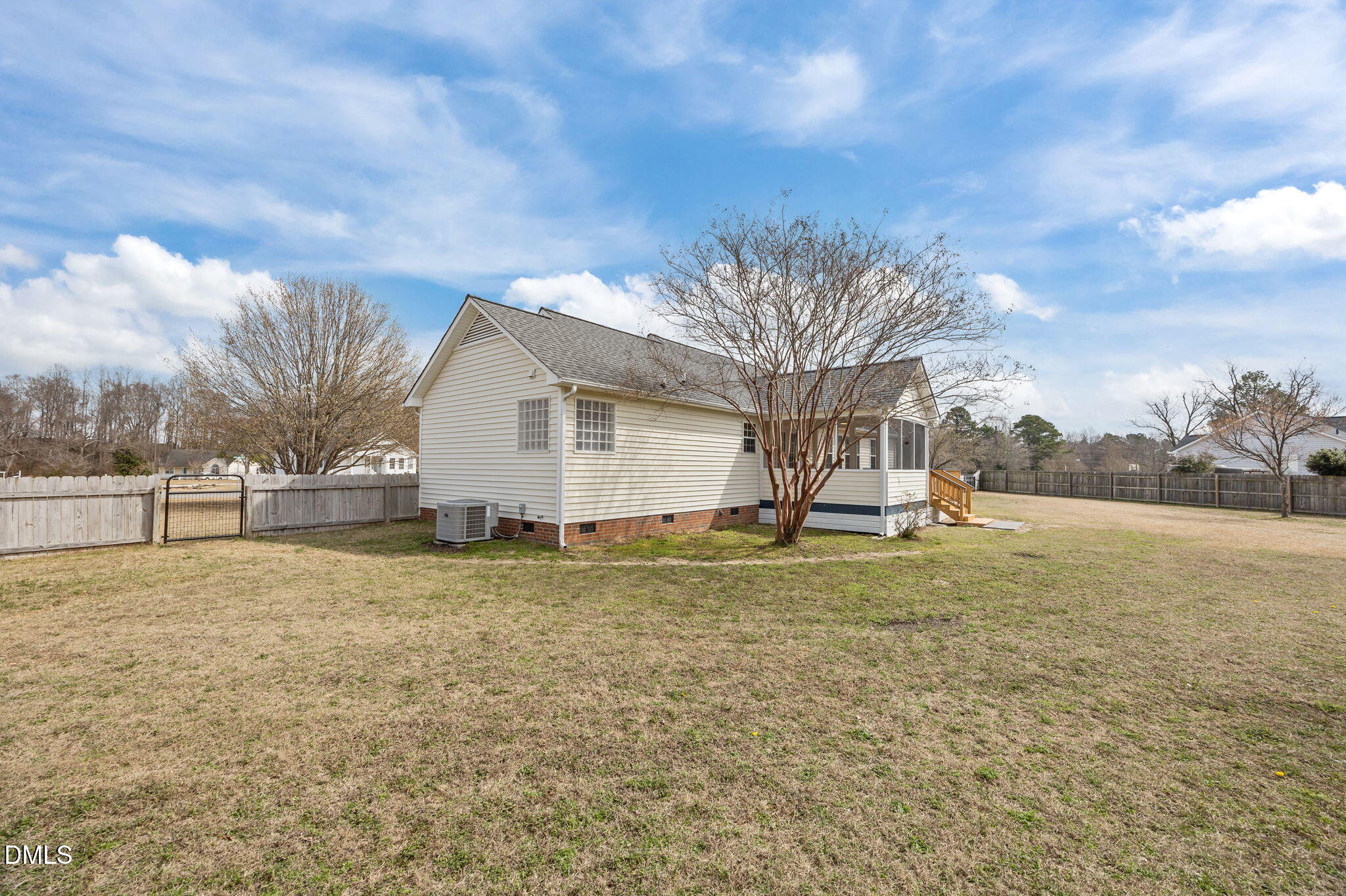 115 Edmondson Drive Willow Spring, NC 27592 - Photo 24 of 39 a view of a house with a yard