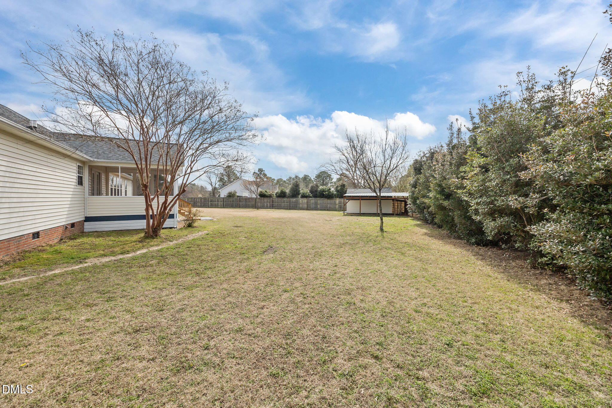 115 Edmondson Drive Willow Spring, NC 27592 - Photo 25 of 39 a swimming pool with outdoor seating and yard