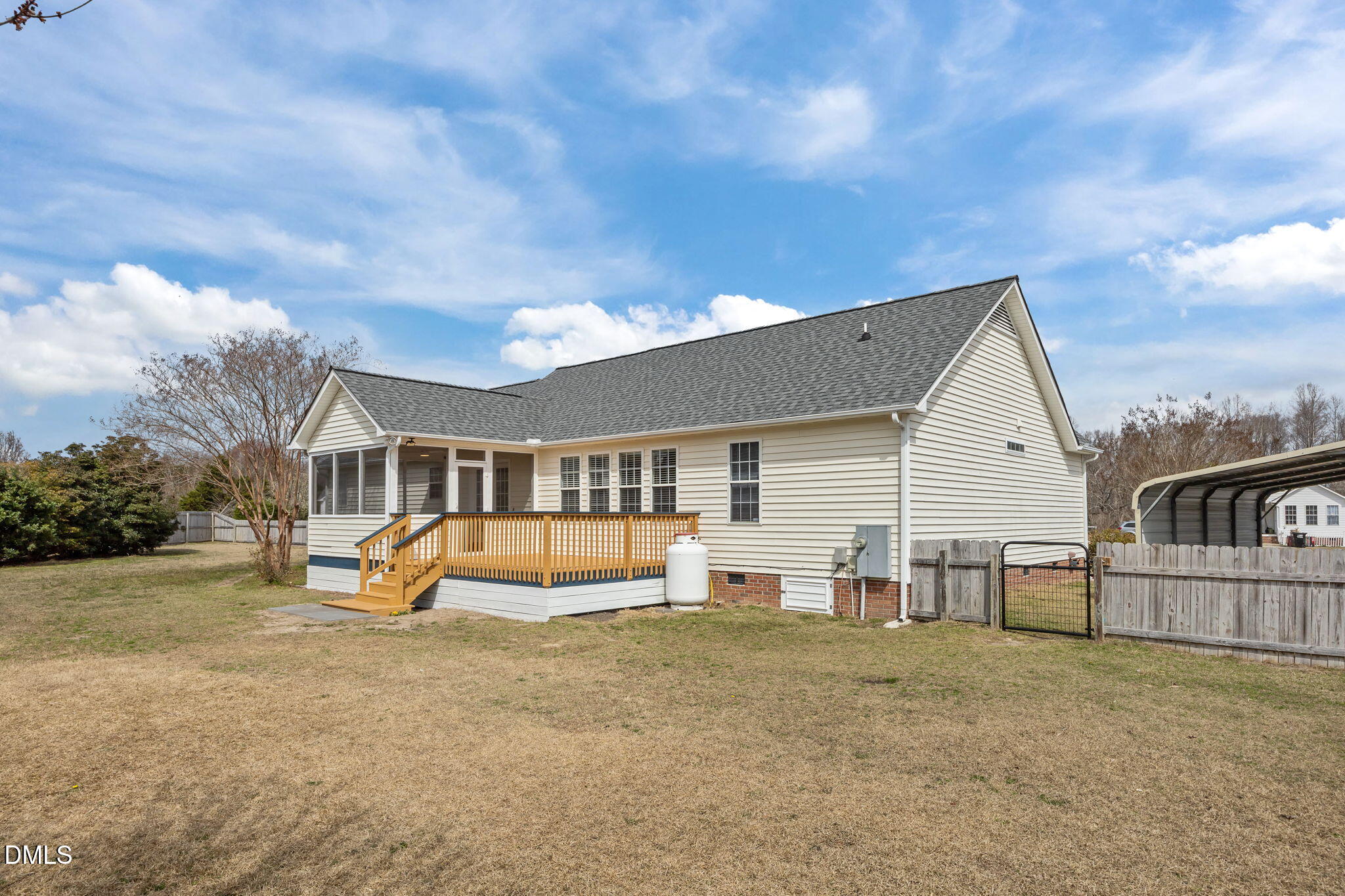 115 Edmondson Drive Willow Spring, NC 27592 - Photo 28 of 39 a view of a house with backyard and sitting area