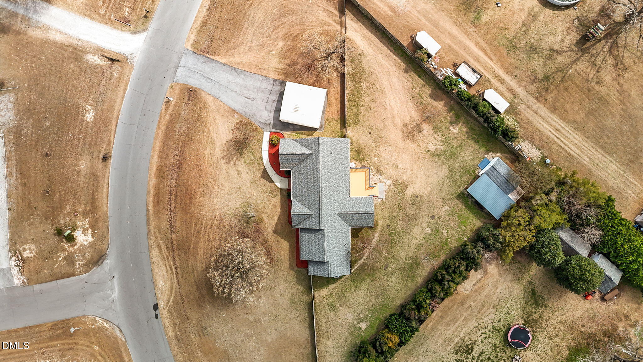115 Edmondson Drive Willow Spring, NC 27592 - Photo 36 of 39 a bathroom with a granite countertop shower and a mirror