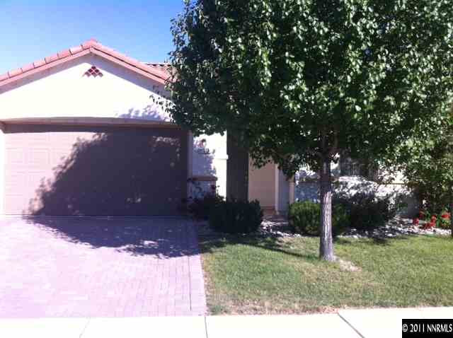 11510 Cervino Drive Reno, NV 89521 - Photo 1 of 1 a backyard of a house with plants and tree