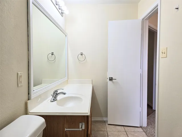 a bathroom with a sink toilet and tub