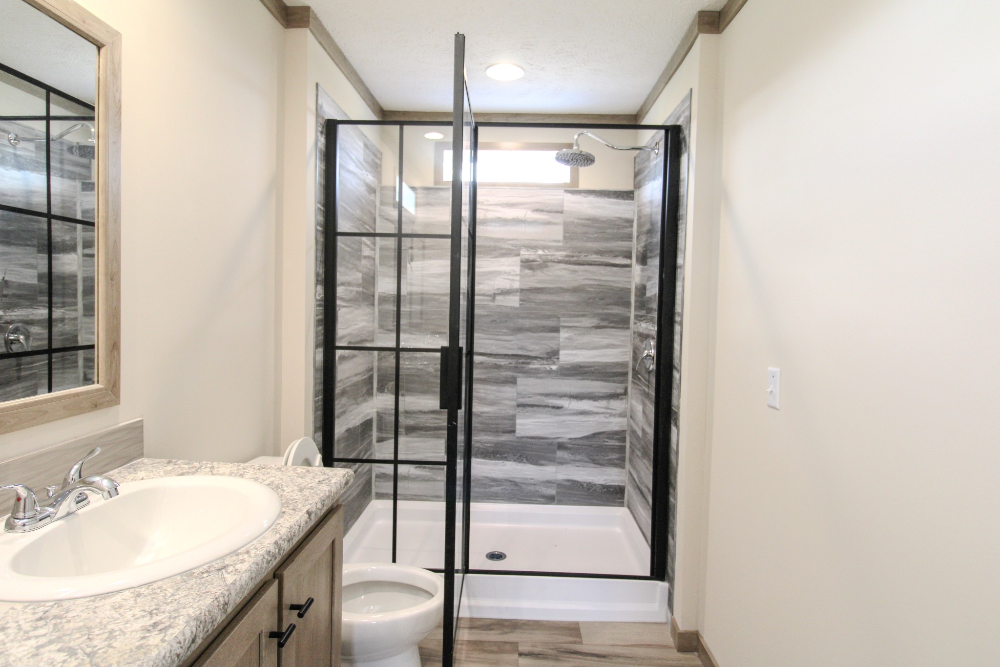 1143 Nimm Road Red Boiling Springs, TN 37150 - Photo 13 of 20 a bathroom with a granite countertop sink and a mirror