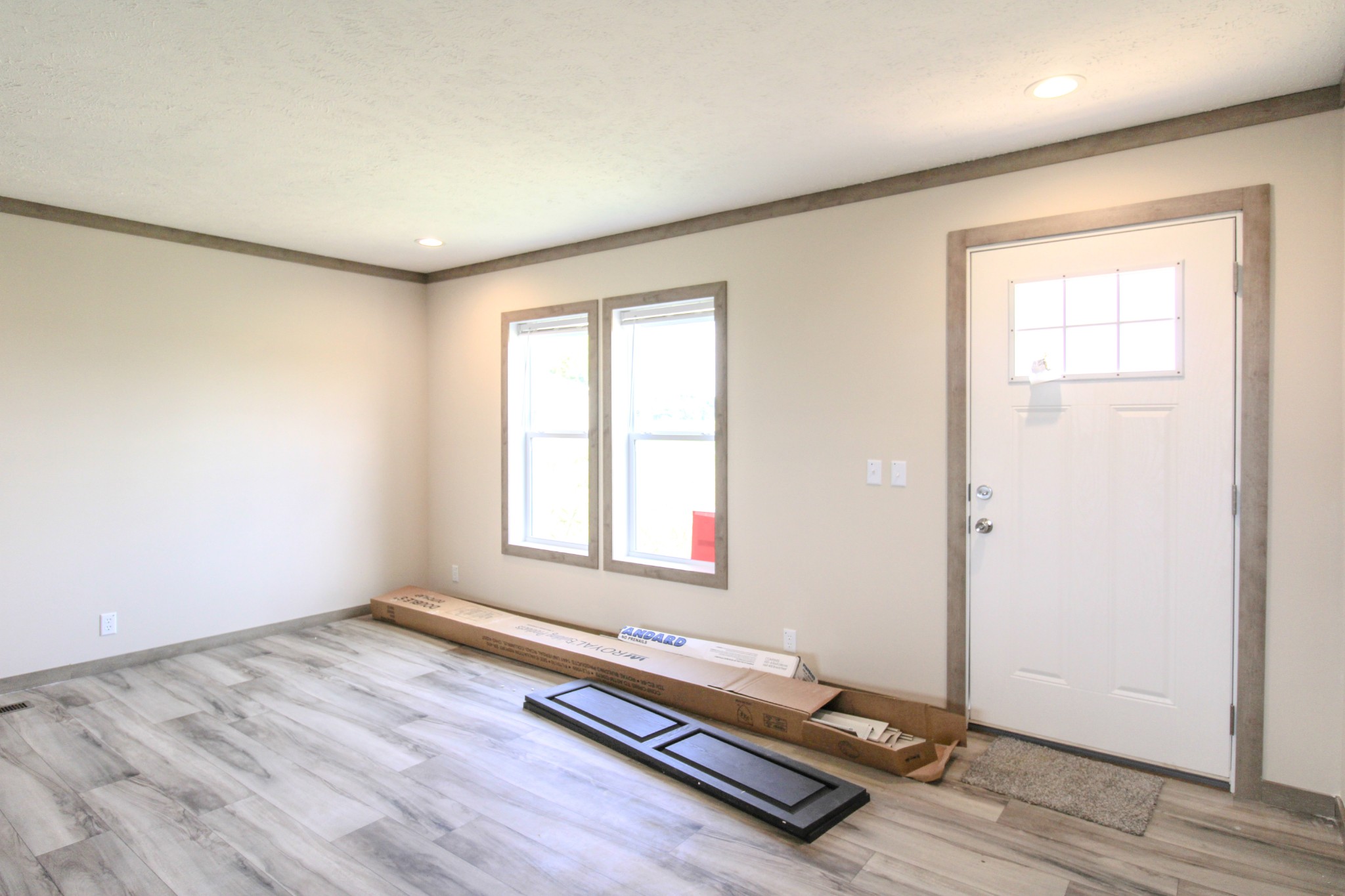 1143 Nimm Road Red Boiling Springs, TN 37150 - Photo 5 of 20 an empty room with wooden floor and windows