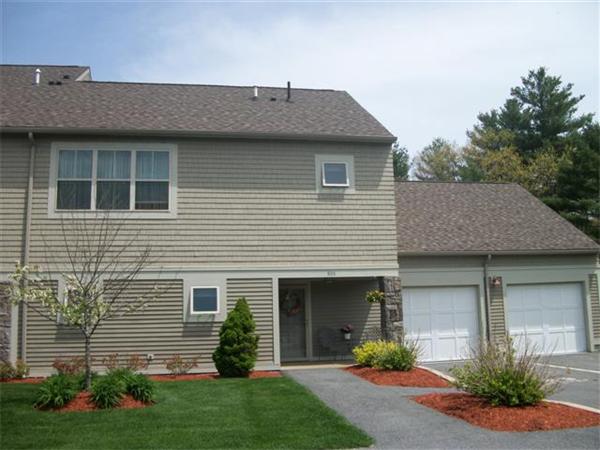 906 Alder Way, Unit 906 North Andover, MA 01845 - Photo 1 of 17 a front view of a house with a garden and plants