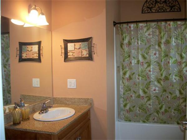 906 Alder Way, Unit 906 North Andover, MA 01845 - Photo 12 of 17 a bathroom with a sink and a mirror