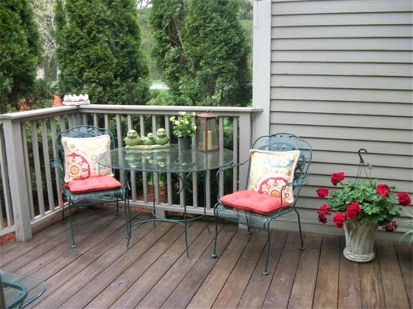 906 Alder Way, Unit 906 North Andover, MA 01845 - Photo 14 of 17 a view of a deck with furniture and wooden floor