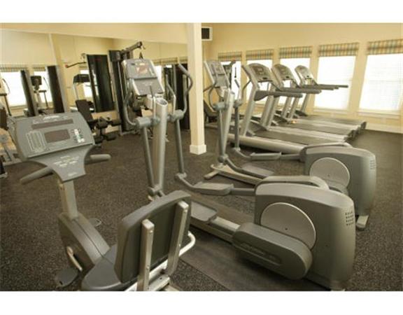 906 Alder Way, Unit 906 North Andover, MA 01845 - Photo 16 of 17 a view of a room with gym equipment