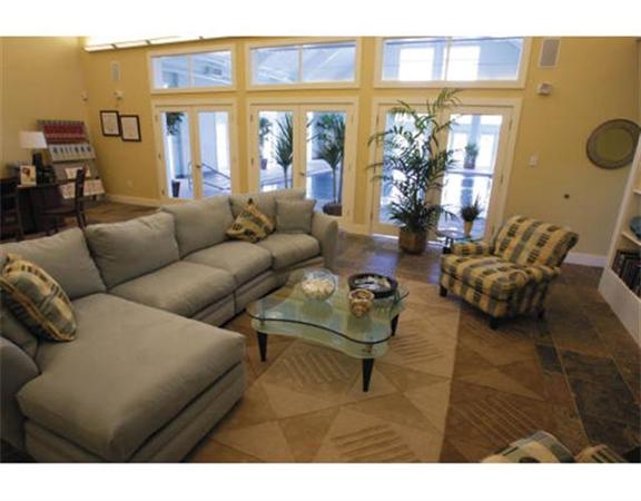 906 Alder Way, Unit 906 North Andover, MA 01845 - Photo 17 of 17 a living room with furniture and a large window