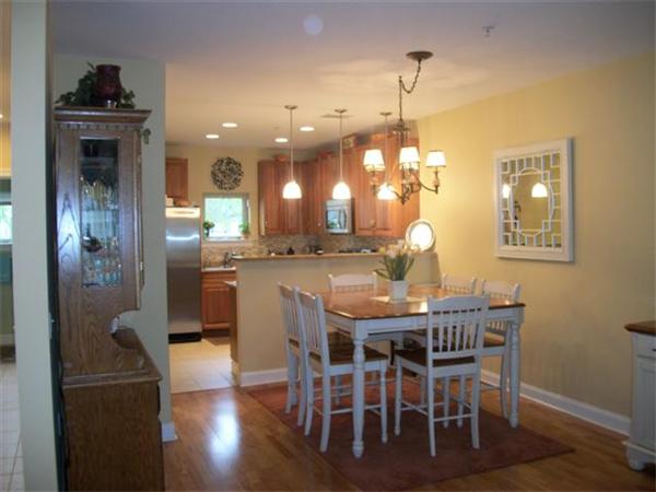906 Alder Way, Unit 906 North Andover, MA 01845 - Photo 5 of 17 a dining room with furniture and window