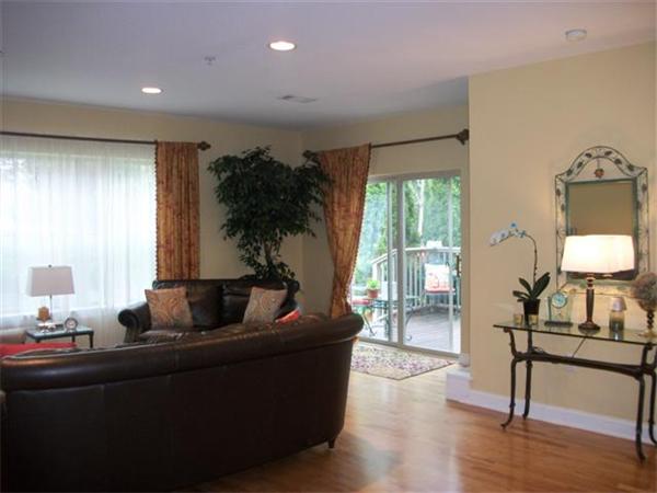 906 Alder Way, Unit 906 North Andover, MA 01845 - Photo 6 of 17 a living room with furniture and a large window