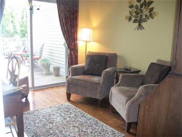 906 Alder Way, Unit 906 North Andover, MA 01845 - Photo 8 of 17 a living room with furniture and a couch