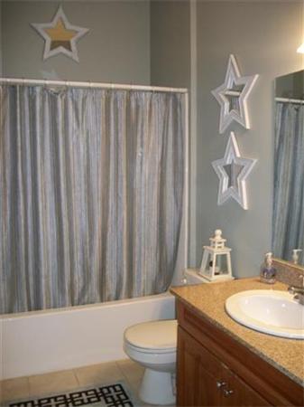 906 Alder Way, Unit 906 North Andover, MA 01845 - Photo 10 of 17 a bathroom with a granite countertop sink and a mirror
