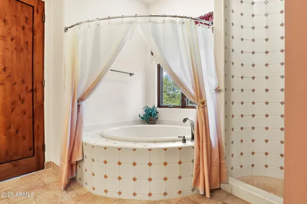 a bathroom with a sink and a bathtub