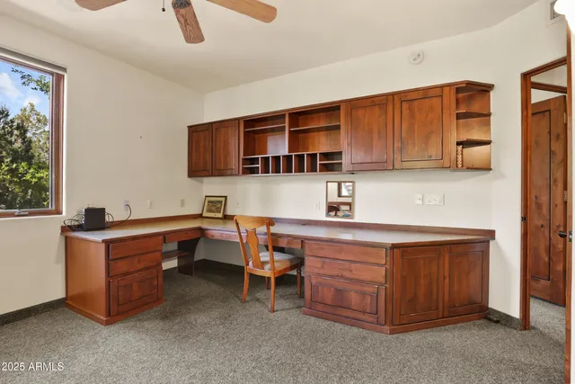 a room with furniture a sink a window and appliances