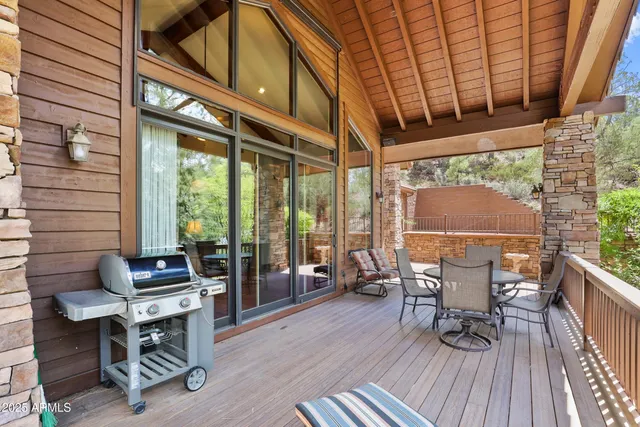 a view of an outdoor space with wooden fence