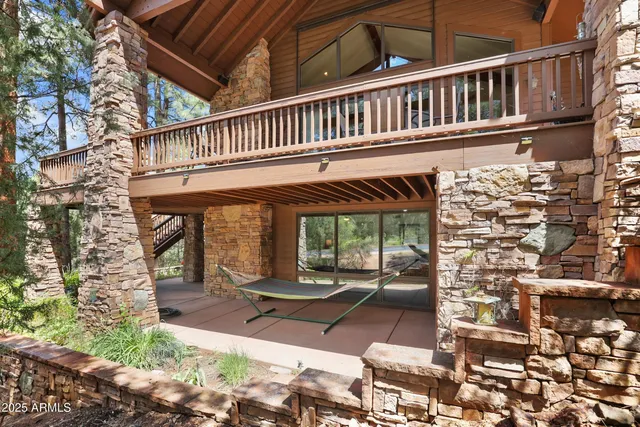 a view of balcony with wooden floor